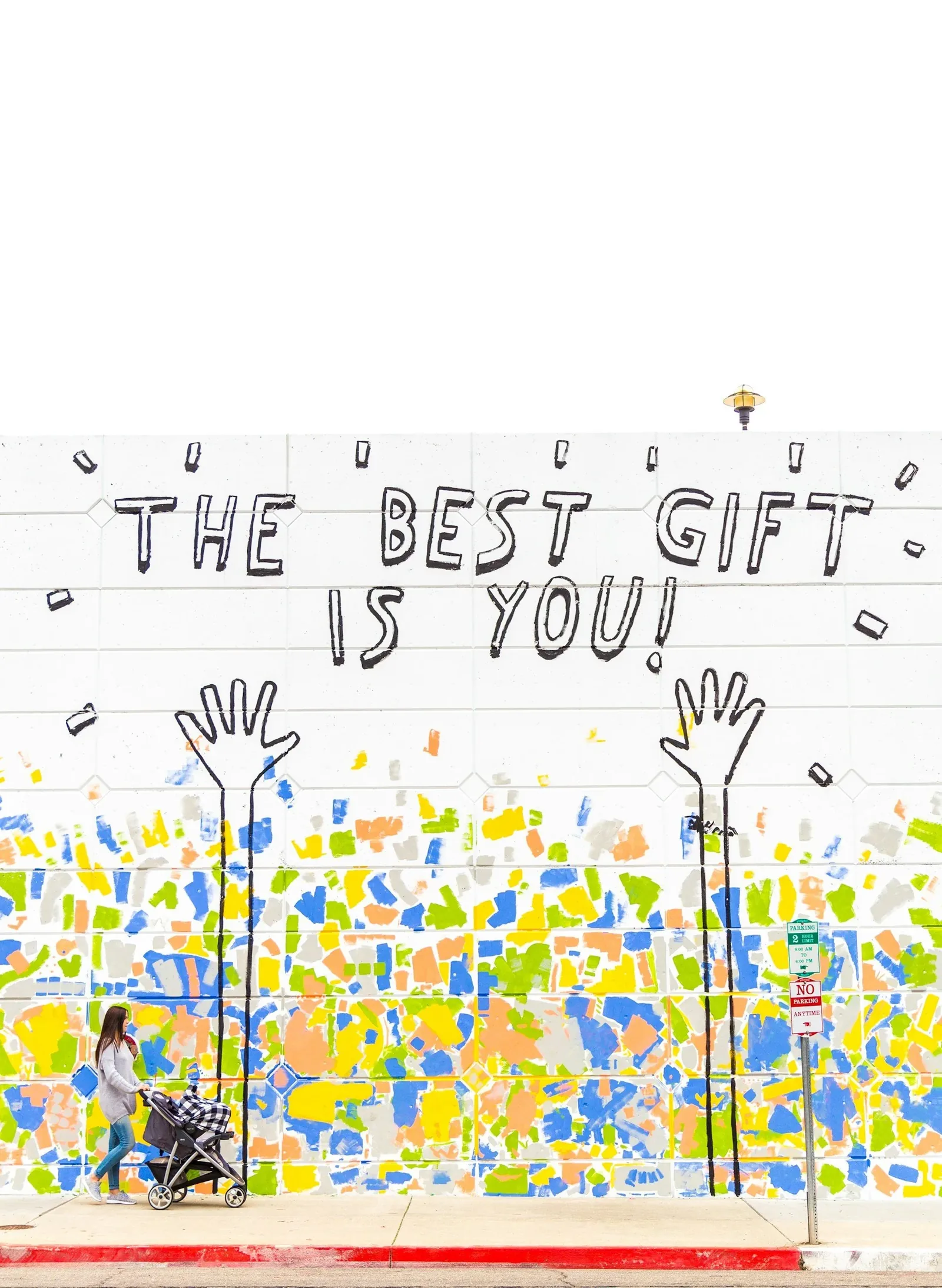 A bright public art installation carrying an encouraging message